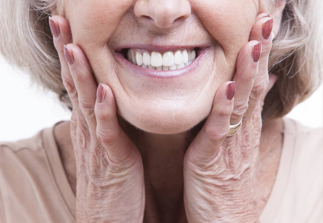 How to Feel Comfortable Smiling Again with Dentures